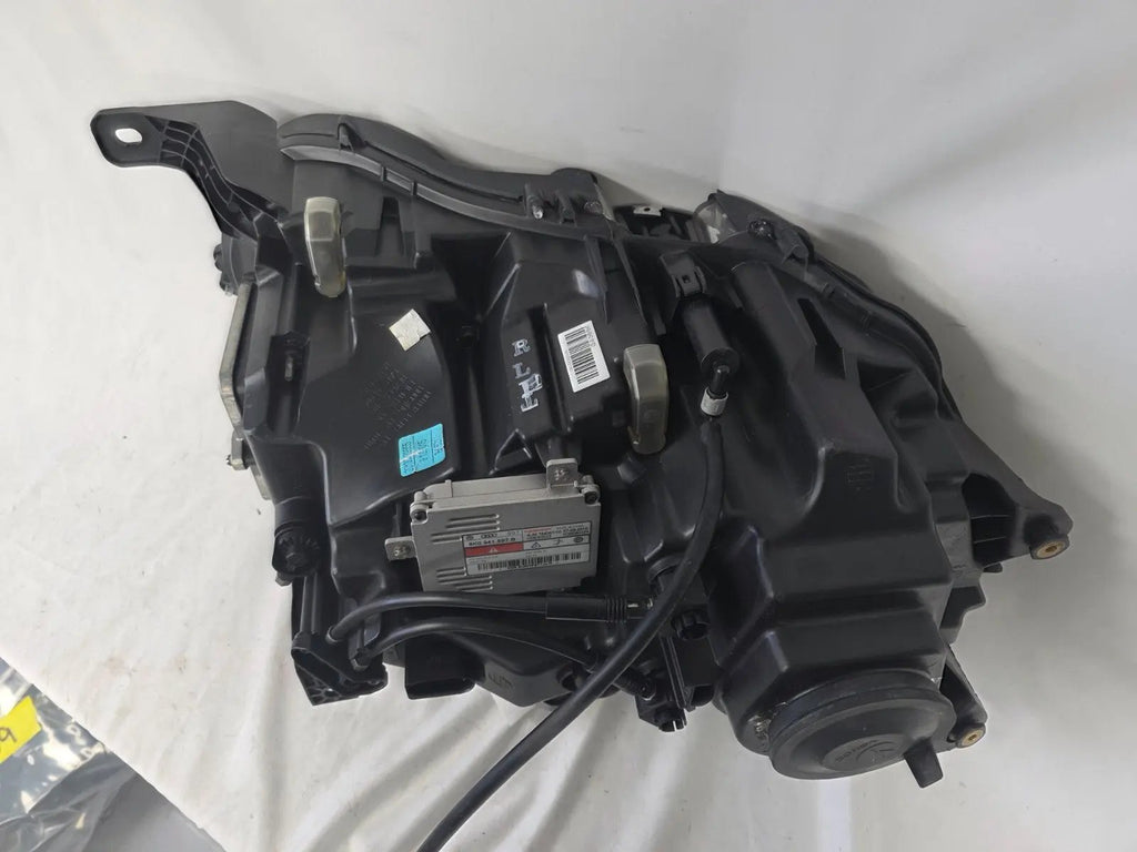 This image shows the left-side headlight for the 2014β2019 Bentley Flying Spur, featuring OEM genuine quality with part number 4W1941015H. This used original headlamp is in excellent condition, offering premium illumination, elegant design, and a precise fit for Bentleyβs high-end luxury sedan