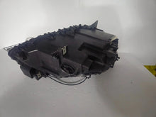 Load image into Gallery viewer, This image features the left-side Xenon headlight for the BMW 7 Series F01/F02 models, showcasing used OEM genuine quality with part number 7225229. Designed specifically for the F01 and F02 chassis, this original headlamp offers high-intensity Xenon lighting and precise fitment for the left side, ensuring reliable performance and compatibility.