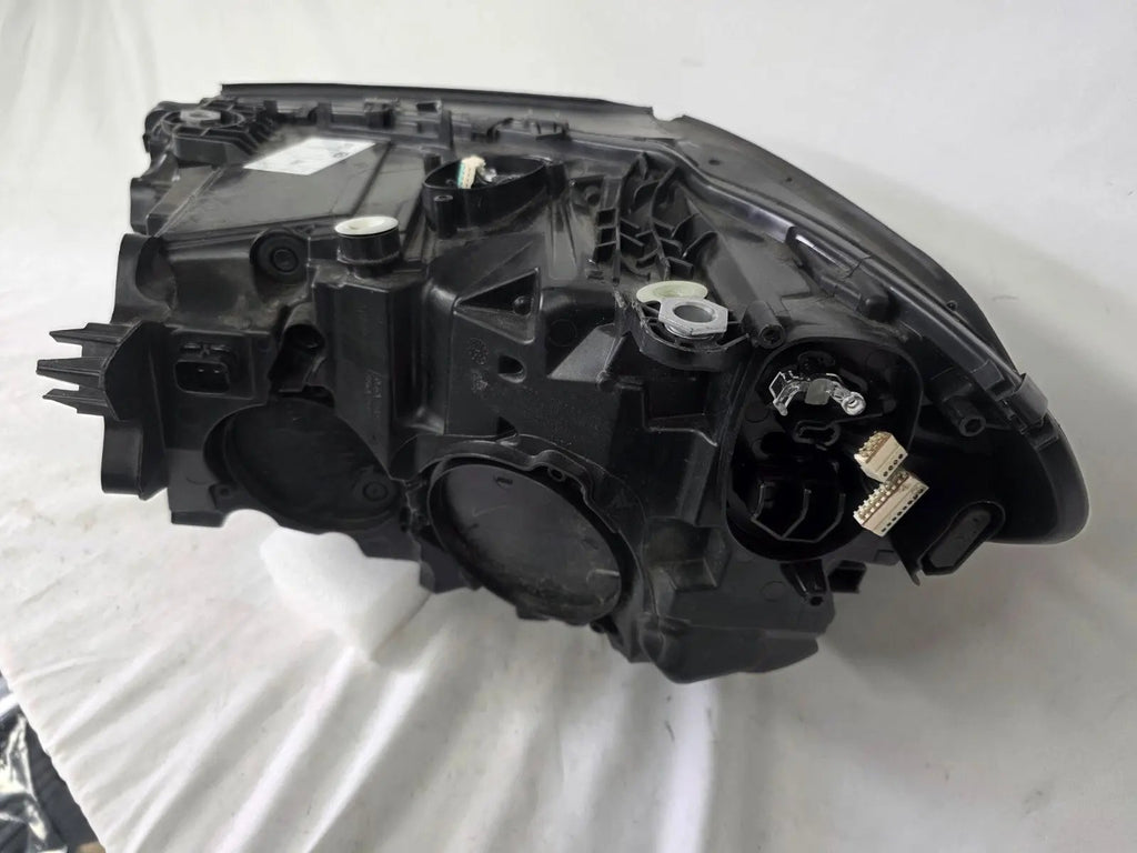 Genuine OEM Adaptive LED headlight for BMW iX3 and compatible models including G08, G01, F97, G02, and F98 with LCI (facelift) updates. This right-side headlamp, part number 5A29204, features adaptive lighting technology for enhanced road illumination and driving safety. The image showcases the original right LED headlight in used condition, clearly showing the lens, housing, and connector points — perfect for replacement on BMW iX3 and related LCI models.