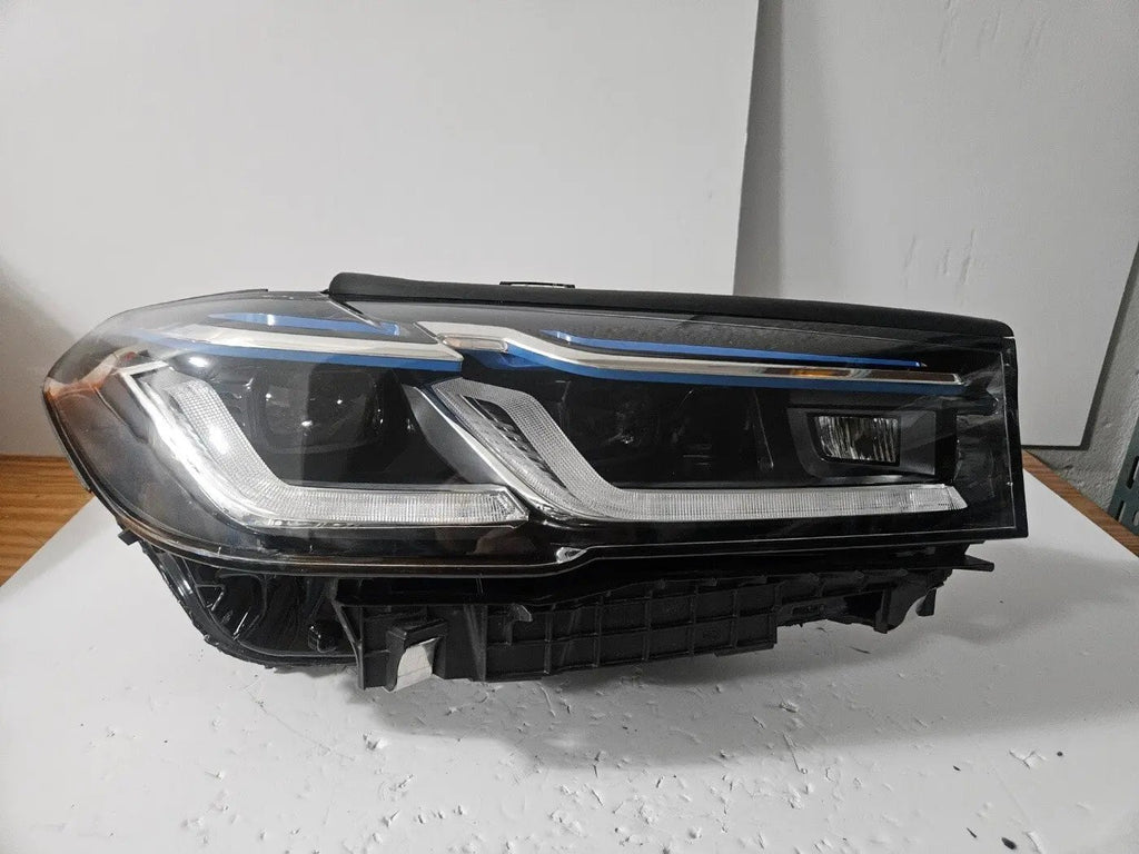 This image displays the right-side Laser headlight for BMW 5 Series G30, G31, and F90 LCI models, featuring OEM genuine quality with part number 9850588. This used original headlamp is designed for a precise fit on the facelifted (LCI) versions of the 5 Series, delivering advanced BMW Laserlight technology for superior visibility, performance, and modern styling
