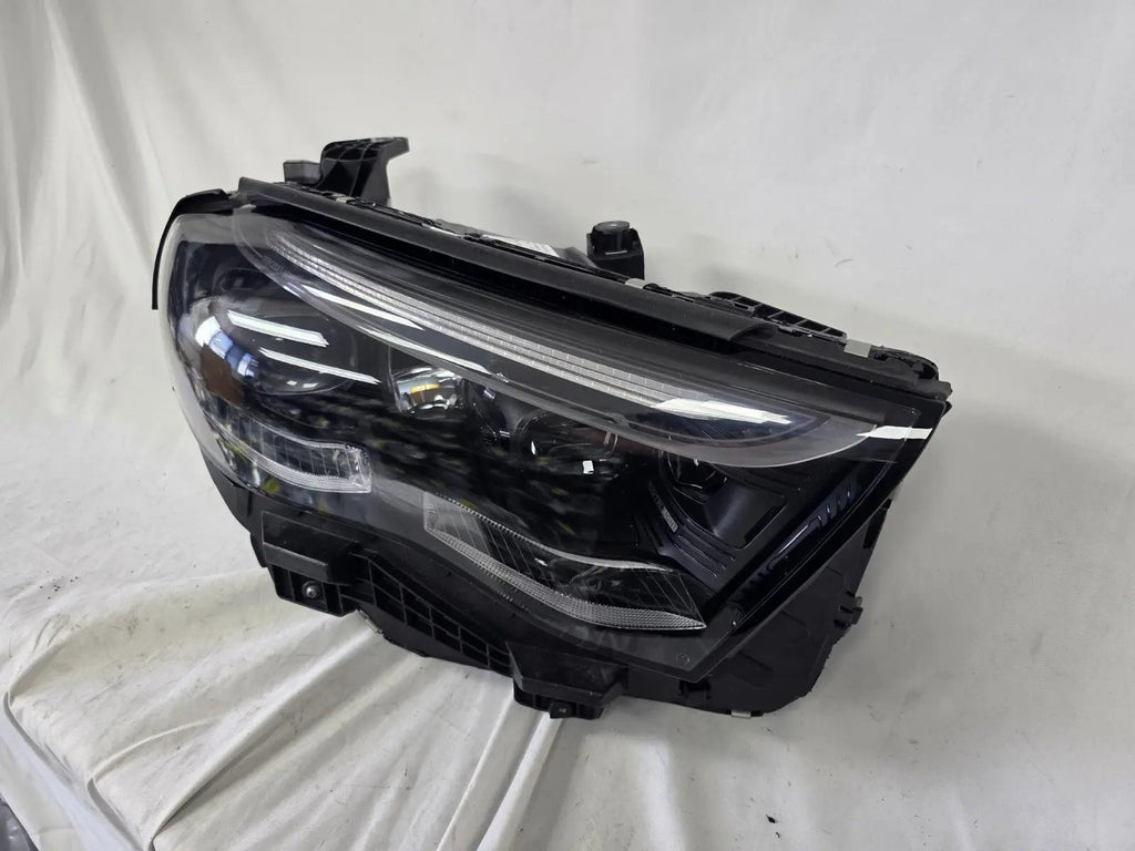 This image features the right-side DIGITAL LIGHT headlight for the Mercedes-Benz E-Class W214, with OEM genuine quality and part number A2149066202. Specifically designed for the W214 model, this used original headlamp incorporates Mercedes-Benz's advanced DIGITAL LIGHT technology, delivering adaptive high-precision illumination and a perfect factory fit on the right side.