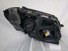 Load image into Gallery viewer, This image features the left-side Multibeam LED headlight for the Mercedes-Benz C-Class W205 Facelift (FL) model, with OEM genuine quality and part number A2059061506. This used original headlamp is designed for a perfect fit on the facelifted W205, delivering advanced Multibeam LED technology for precise, adaptive lighting and optimal driving visibility