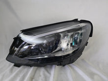 Load image into Gallery viewer, This image features the left-side Multibeam LED headlight for the Mercedes-Benz C-Class W205 Facelift (FL) model, with OEM genuine quality and part number A2059061506. This used original headlamp is designed for a perfect fit on the facelifted W205, delivering advanced Multibeam LED technology for precise, adaptive lighting and optimal driving visibility