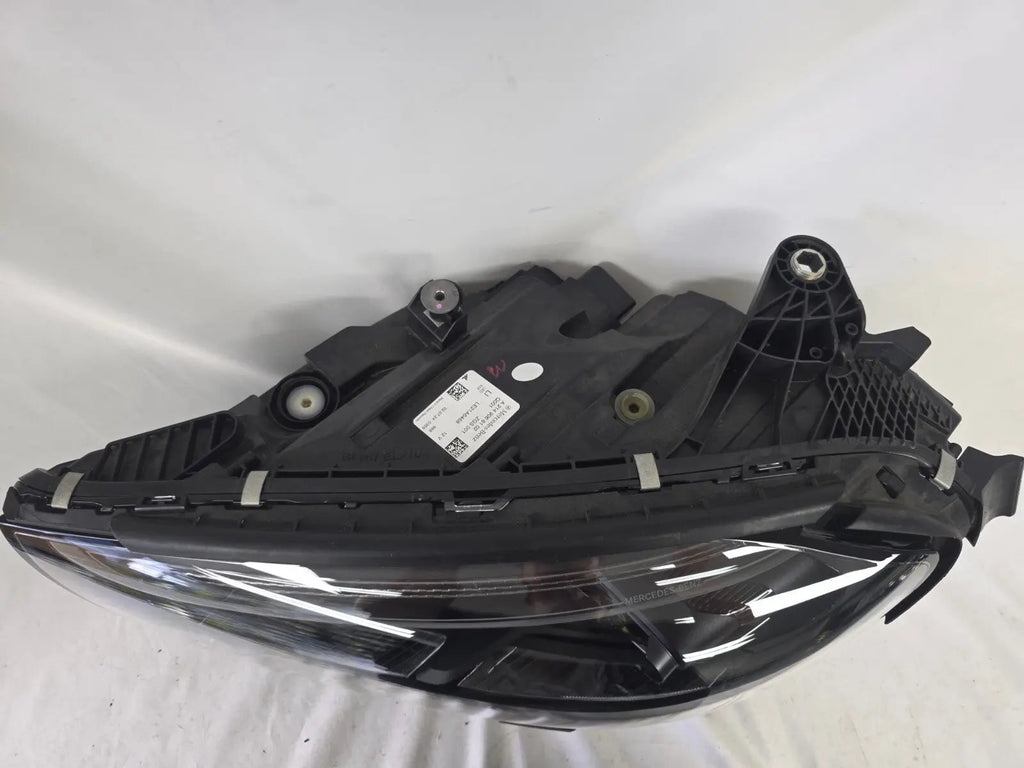 This image showcases the OEM genuine DIGITAL LIGHT headlights for the Mercedes-Benz E-Class W214, available for both right and left sides with part numbers A2149066102 (right) and A2149066202 (left). These advanced headlamps are original Mercedes-Benz components designed for the W214 model, offering cutting-edge DIGITAL LIGHT technology that enhances driving safety and precision lighting. The headlights are used but maintain high-quality OEM standards and are ideal replacements for the corresponding side.