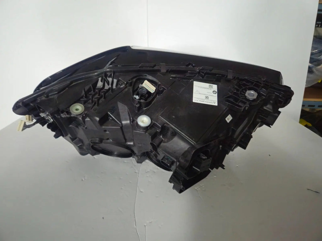 This image features the left-side Adaptive LED headlight for BMW models including iX3 G08, X3 G01, X3 M F97, X4 G02, and X4 M F98, with OEM genuine quality and part number 5A29203. This used original headlamp provides precise fitment and BMW’s advanced Adaptive LED technology, ensuring enhanced visibility, dynamic beam control, and premium styling for these performance SUVs.