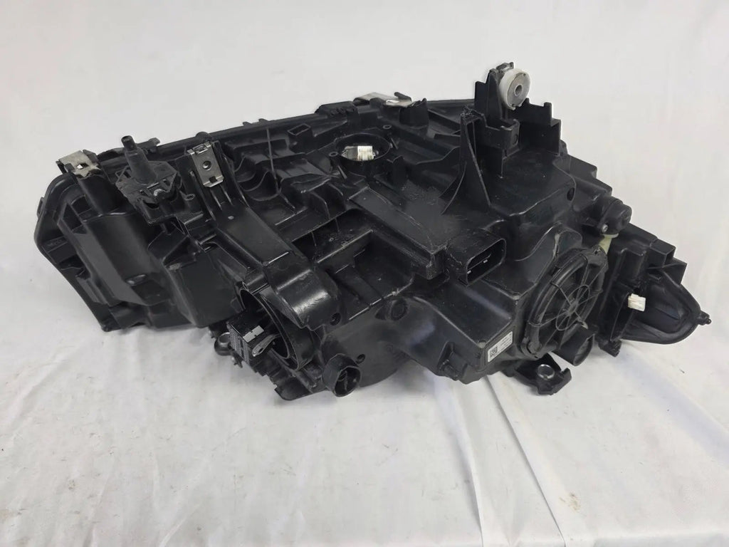 This image shows the left-side Adaptive LED headlight (ICON design) for the BMW 6 Series GT G32 model, featuring OEM genuine quality with part number 7496443. This used original headlamp is designed to deliver advanced Adaptive LED lighting with BMW’s ICON styling, offering precise fitment, enhanced road illumination, and premium performance for the 6 Series Gran Turismo.