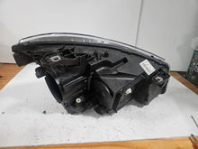 Load image into Gallery viewer, This image shows the left-side Xenon headlight for the Mercedes-Benz CLA Class C117, featuring original OEM quality with part number A1179065100. The headlight is a used but genuine component, designed to perfectly fit the left side of the CLA C117 model. It includes the factory-built Xenon lighting system and showcases the durable construction expected from Mercedes-Benz parts.
