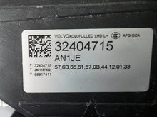 Load image into Gallery viewer, This image features the left-side Xenon headlight for the Volvo XC90, showcasing OEM genuine quality with part number 32404715. This used original headlamp is designed for accurate fitment and delivers powerful Xenon illumination, ensuring optimal visibility, durability, and premium performance for the XC90 luxury SUV