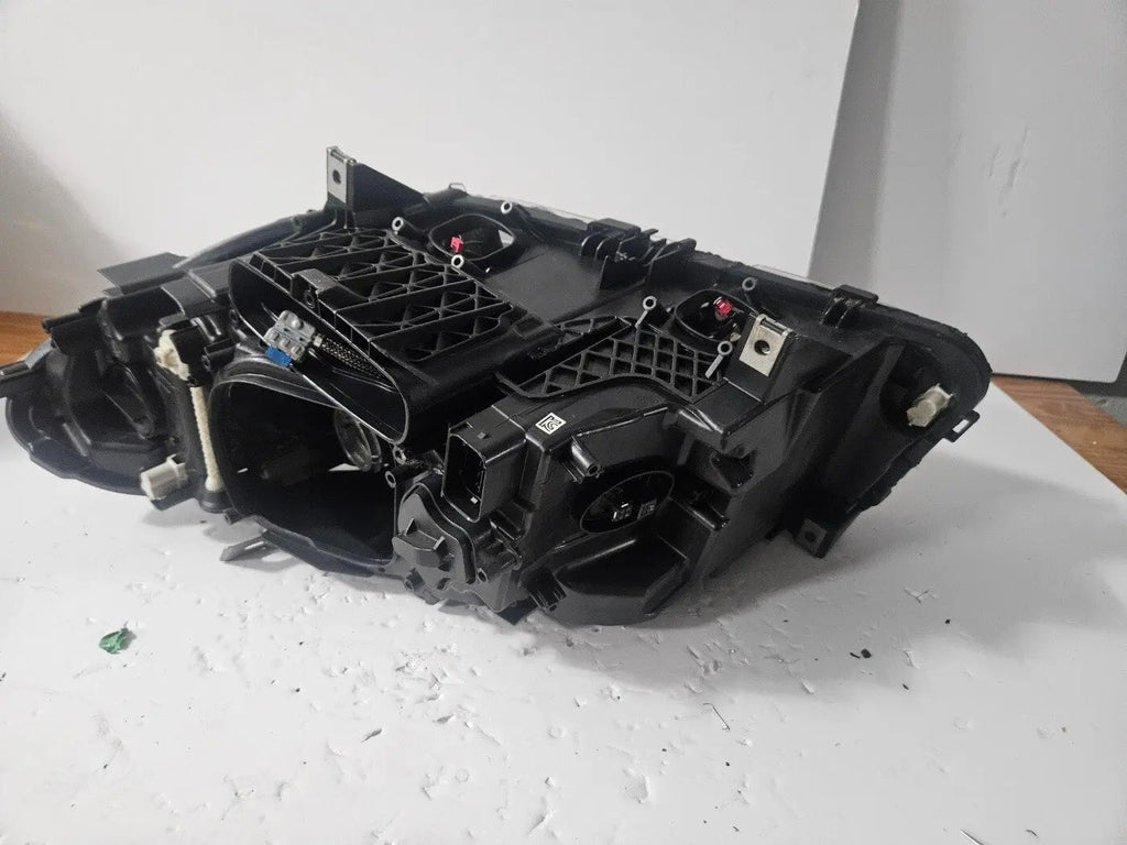 This image displays the right-side Xenon headlight for the BMW 5 Series F18 LCI, F10 LCI, and F11 LCI models, featuring OEM genuine quality with part number 7343912. This used original headlamp is designed specifically for the facelifted (LCI) versions, offering precise fitment, powerful Xenon illumination, and the premium durability expected from authentic BMW components.