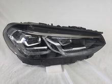 Load image into Gallery viewer, Genuine OEM Adaptive LED headlight for BMW iX3 and compatible models including G08, G01, F97, G02, and F98 with LCI (facelift) updates. This right-side headlamp, part number 5A29204, features adaptive lighting technology for enhanced road illumination and driving safety. The image showcases the original right LED headlight in used condition, clearly showing the lens, housing, and connector points — perfect for replacement on BMW iX3 and related LCI models.