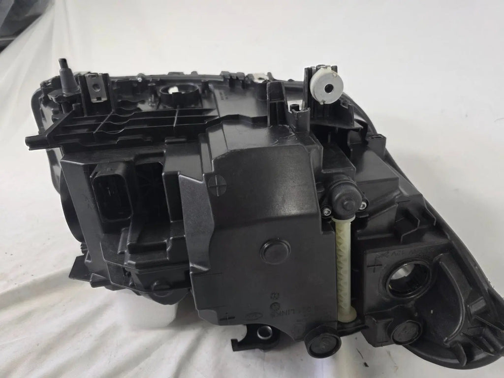 This image shows the left-side LED headlight for the BMW 5 Series G30 and G31 models, featuring OEM genuine quality with part number 7439199. This used original headlamp is engineered for a precise fit on the left side, offering bright and efficient LED illumination, modern styling, and the reliable performance expected from BMW components.