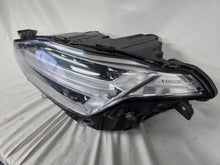 Load image into Gallery viewer, This image features the left-side Xenon headlight for the Volvo XC90, showcasing OEM genuine quality with part number 32404715. This used original headlamp is designed for accurate fitment and delivers powerful Xenon illumination, ensuring optimal visibility, durability, and premium performance for the XC90 luxury SUV