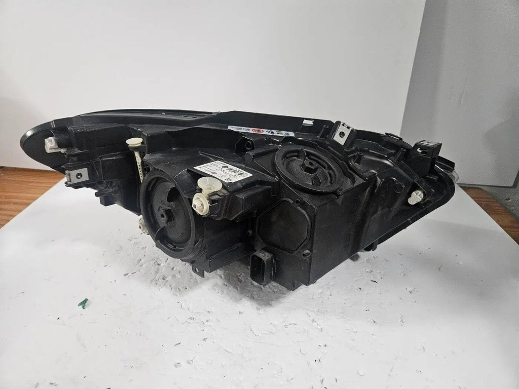 This image displays the left-side LED headlight for the BMW 1 Series F20 and F21 models, featuring OEM genuine quality with part number 7358391. This used original headlamp offers bright LED illumination, precise factory fitment, and durable performance, perfectly suited for the sporty and compact design of the BMW 1 Series