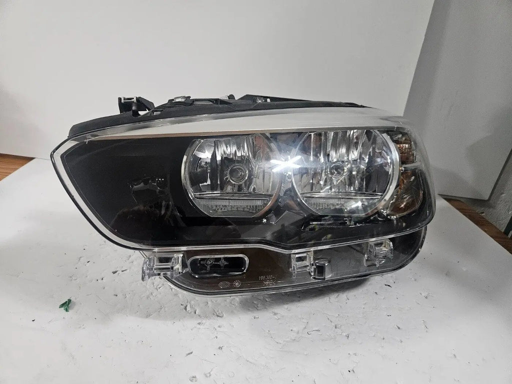 This image displays the left-side LED headlight for the BMW 1 Series F20 and F21 models, featuring OEM genuine quality with part number 7358391. This used original headlamp offers bright LED illumination, precise factory fitment, and durable performance, perfectly suited for the sporty and compact design of the BMW 1 Series