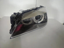 Load image into Gallery viewer, This image features the left-side Xenon headlight for the BMW 7 Series F01/F02 models, showcasing used OEM genuine quality with part number 7225229. Designed specifically for the F01 and F02 chassis, this original headlamp offers high-intensity Xenon lighting and precise fitment for the left side, ensuring reliable performance and compatibility.