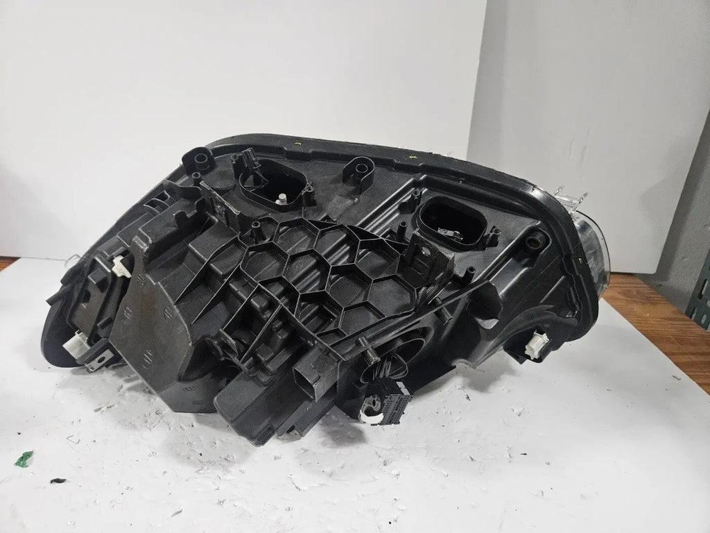 This image displays the right-side LED headlight for the BMW 1 Series F20 and F21 LCI (facelift) models, featuring OEM genuine quality with part number 7414142. This used original headlamp is engineered for a precise fit on the facelifted 1 Series, offering bright LED illumination, modern styling, and reliable performance from an authentic BMW component