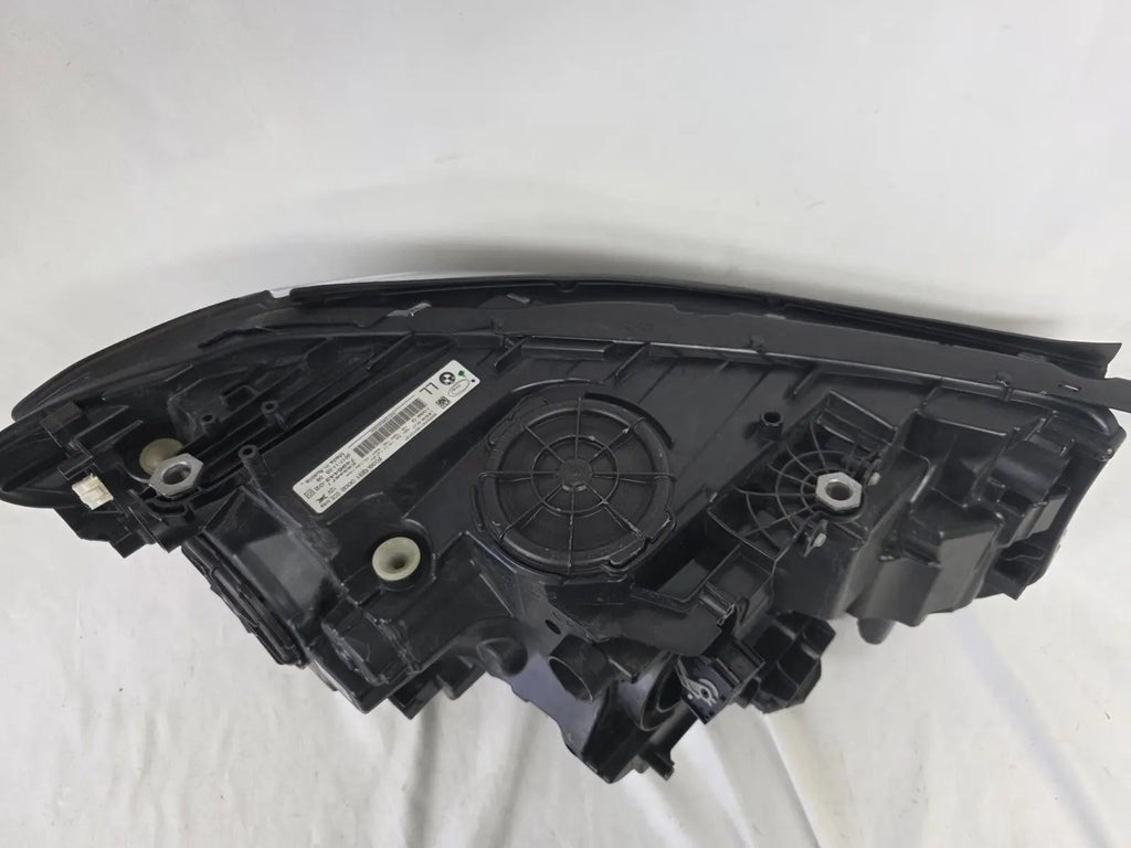 This image shows the left-side Adaptive LED headlight (ICON design) for the BMW 6 Series GT G32 model, featuring OEM genuine quality with part number 7496443. This used original headlamp is designed to deliver advanced Adaptive LED lighting with BMW’s ICON styling, offering precise fitment, enhanced road illumination, and premium performance for the 6 Series Gran Turismo.
