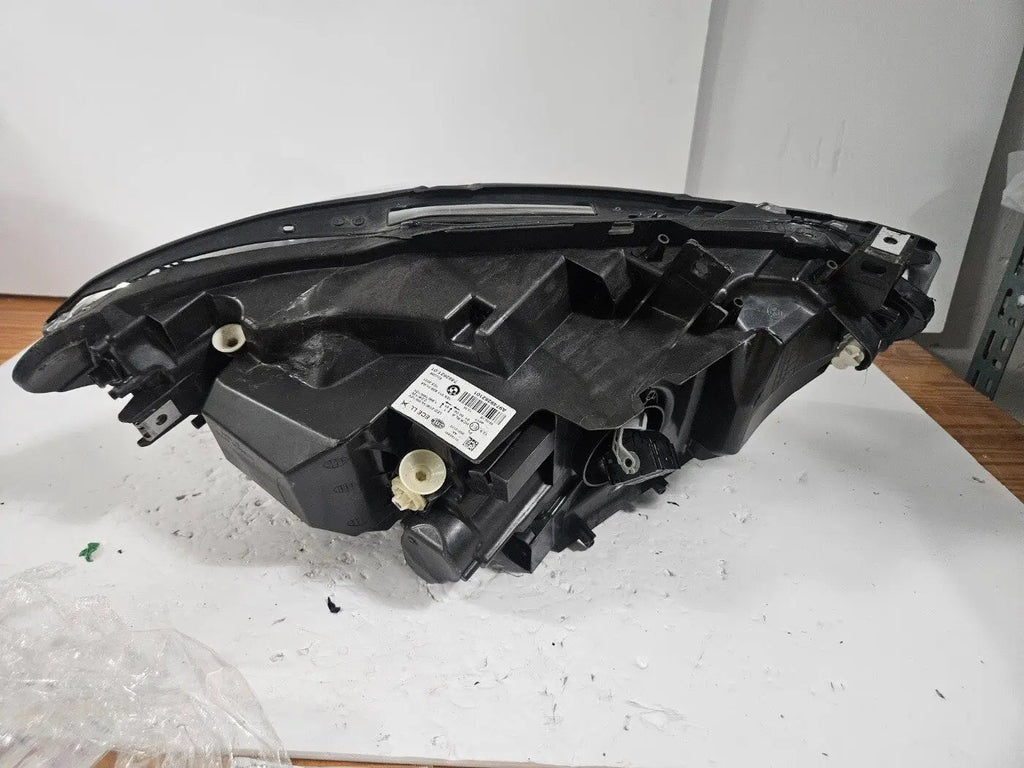 This image features the left-side LED headlight for the BMW 1 Series F20 and F21 LCI (facelift) models, with OEM genuine quality and part number 7492621. This used original headlamp is designed specifically for the facelifted versions, offering sharp LED illumination, precise fitment, and the premium build quality expected from BMW OEM components