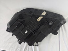 Load image into Gallery viewer, Used genuine BMW Adaptive LED headlight for X1 F48 LCI (facelift) model. This right-side OEM headlamp, part number 5A01178, is equipped with adaptive lighting technology for improved night visibility and cornering performance. The image displays the original right Adaptive LED headlight in used condition, showing the clear lens, mounting brackets, and electrical connectors — an ideal OEM replacement for BMW X1 F48 LCI vehicles.