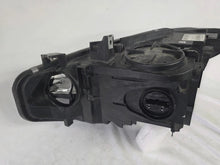 Load image into Gallery viewer, Genuine used BMW Adaptive LED headlight for 4 Series models F32, F33, F36, F80 LCI, F82, and F83. This right-side OEM headlamp, part number 7377842, is designed with adaptive lighting technology for improved visibility and performance. The image highlights the complete original headlight unit in used condition, including the clear lens, mounting points, and electrical connectors — ideal for replacement on compatible BMW models.