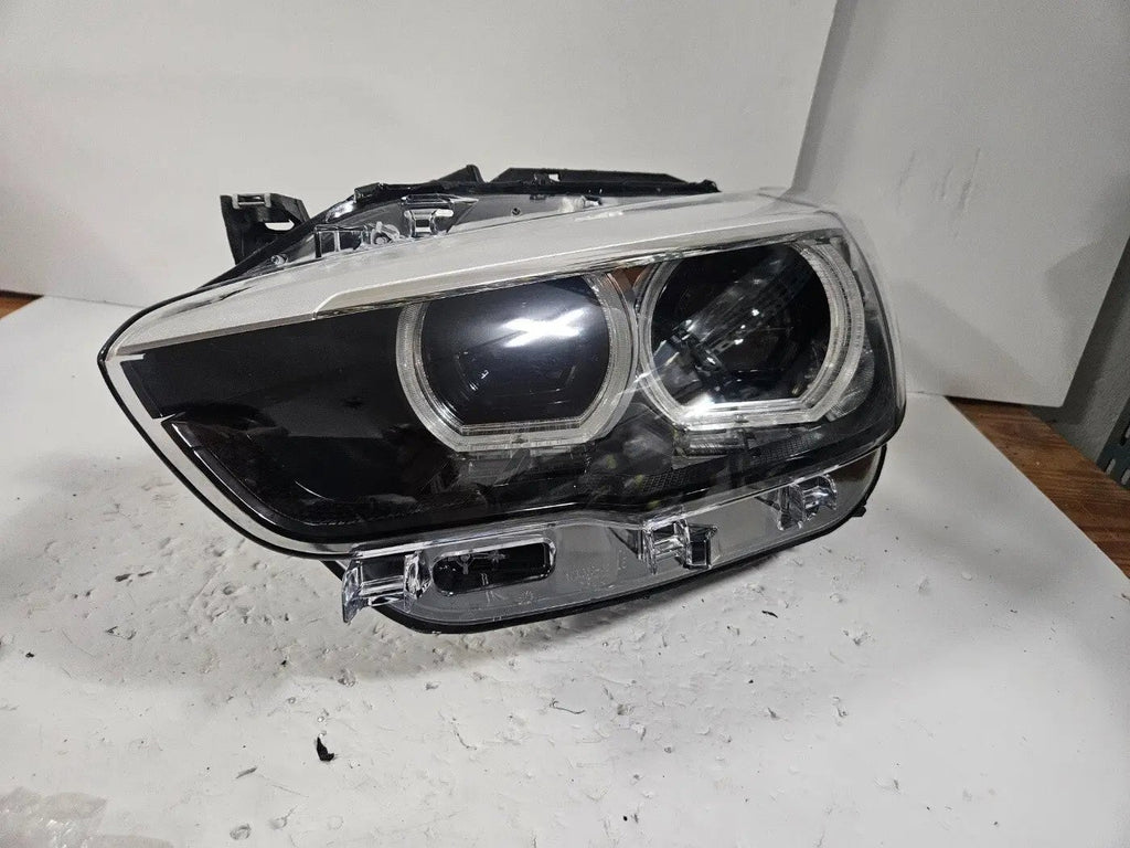 This image features the left-side LED headlight for the BMW 1 Series F20 and F21 LCI (facelift) models, with OEM genuine quality and part number 7492621. This used original headlamp is designed specifically for the facelifted versions, offering sharp LED illumination, precise fitment, and the premium build quality expected from BMW OEM components
