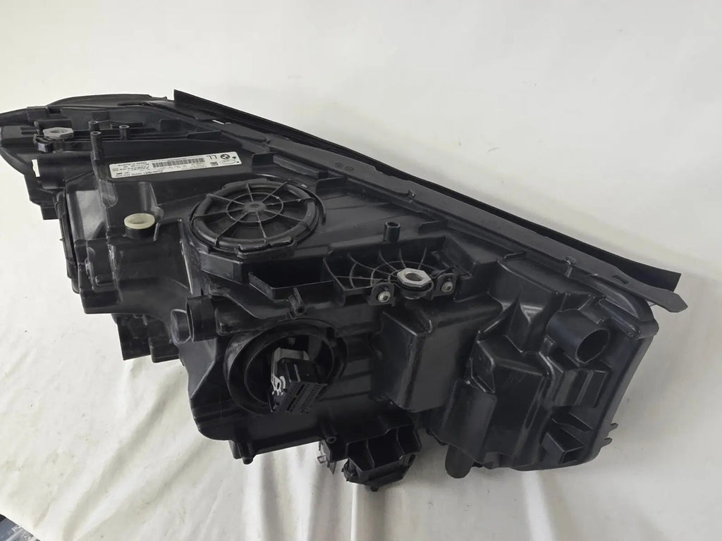 This image shows the left-side Adaptive LED headlight (ICON design) for the BMW 6 Series GT G32 model, featuring OEM genuine quality with part number 7496443. This used original headlamp is designed to deliver advanced Adaptive LED lighting with BMW’s ICON styling, offering precise fitment, enhanced road illumination, and premium performance for the 6 Series Gran Turismo.