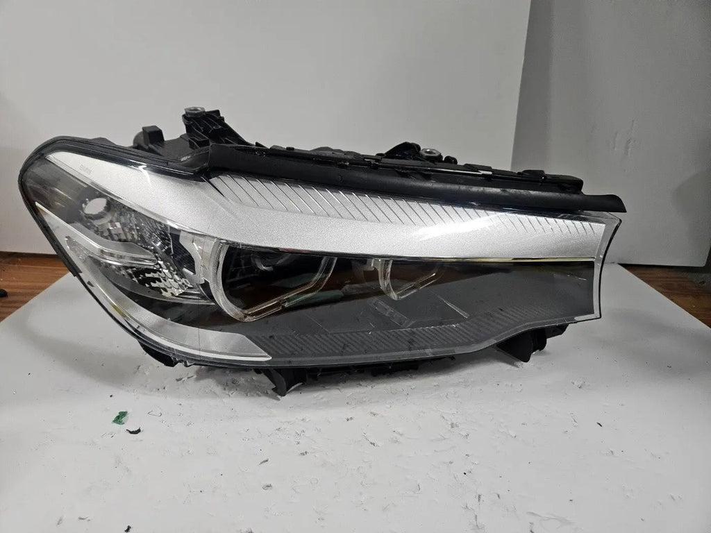 This image features the right-side LED headlight for the BMW 5 Series G30 and G31 models, with OEM genuine quality and part number 7439200. This used original headlamp is designed for a perfect fit on the right side, delivering bright LED illumination, modern styling, and the premium performance expected from authentic BMW components