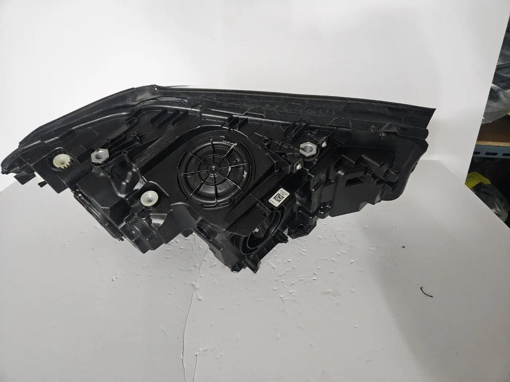 This image shows the left-side Adaptive LED ICON headlight for the BMW 5 Series G30, G31, G38, and F90 LCI models, featuring OEM genuine quality with part number 8499121. This used original headlamp is designed for the facelifted (LCI) versions of these models, offering BMW’s signature Adaptive LED ICON lighting technology for enhanced visibility, precise beam control, and a sleek, modern design.