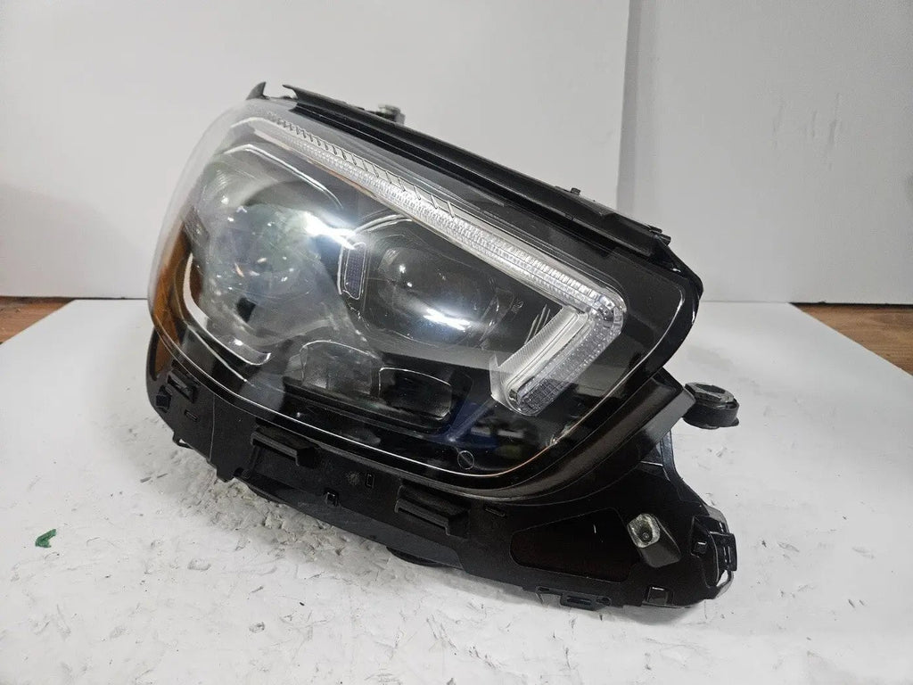 This image displays the right-side Multibeam LED headlight for the Mercedes-Benz E-Class W213 Facelift model, featuring OEM genuine quality with part number A2139066810. The headlight is an original Mercedes component, designed specifically for the facelifted W213 E-Class, offering advanced Multibeam LED lighting technology for superior road visibility and performance. This is a used but authentic part, ensuring compatibility and reliability.