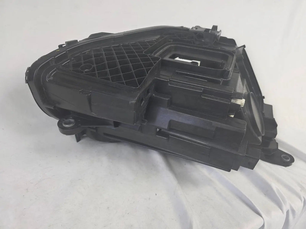 This image displays the left-side Multibeam LED headlight with blue accents for the Mercedes-Benz E-Class W213, featuring OEM genuine quality and part number A2139066504. This original used headlamp is designed for precise fitment on the W213 model, offering advanced Multibeam LED technology with distinctive blue detailing for high-performance adaptive illumination and premium styling