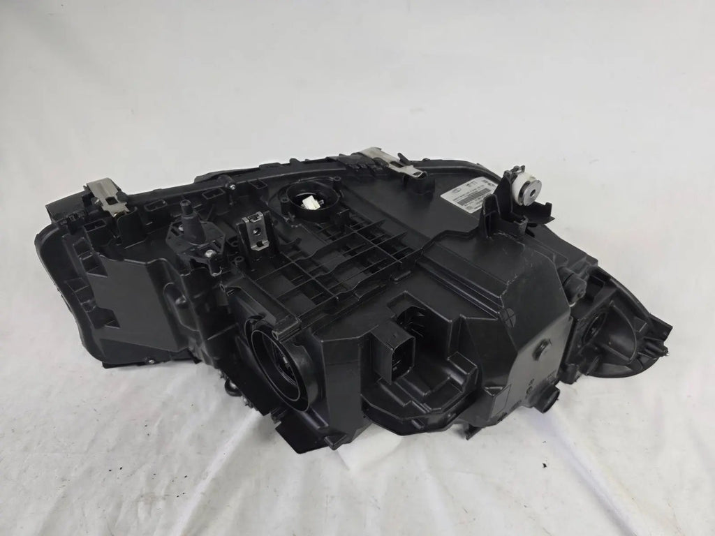 This image shows the left-side LED headlight for the BMW 5 Series G30 and G31 models, featuring OEM genuine quality with part number 7439199. This used original headlamp is engineered for a precise fit on the left side, offering bright and efficient LED illumination, modern styling, and the reliable performance expected from BMW components.