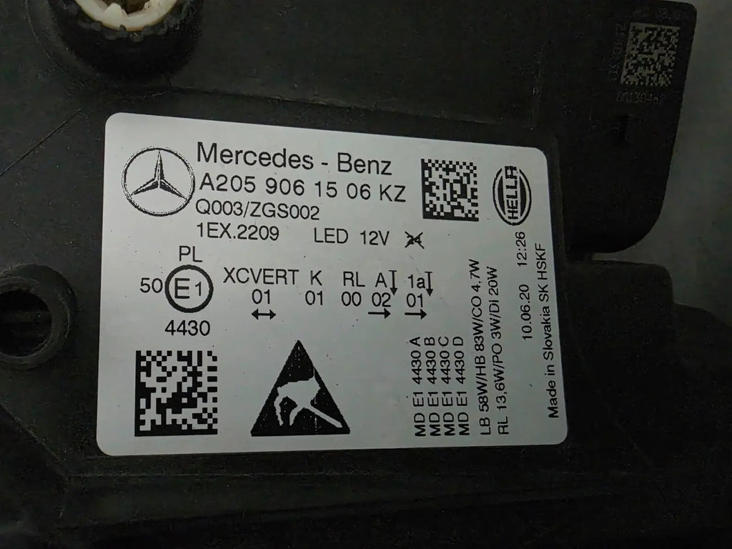 This image features the left-side Multibeam LED headlight for the Mercedes-Benz C-Class W205 Facelift (FL) model, with OEM genuine quality and part number A2059061506. This used original headlamp is designed for a perfect fit on the facelifted W205, delivering advanced Multibeam LED technology for precise, adaptive lighting and optimal driving visibility
