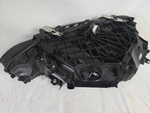 Load image into Gallery viewer, Used genuine BMW LED headlight for 4 Series models including G22, G23, G26, G80, G82, and G83. This left-side OEM headlamp, part number 9851035, is designed to perfectly fit and function in compatible BMW vehicles. The image shows the original BMW LED headlight in used condition with visible connectors, housing, and lens – ideal for replacement or repair of your vehicle’s front lighting system.