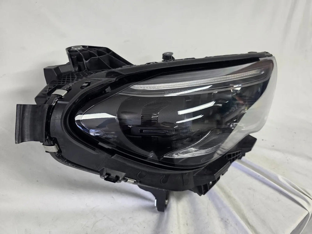 This image features the right-side DIGITAL LIGHT headlight for the Mercedes-Benz E-Class W214, with OEM genuine quality and part number A2149066202. Specifically designed for the W214 model, this used original headlamp incorporates Mercedes-Benz's advanced DIGITAL LIGHT technology, delivering adaptive high-precision illumination and a perfect factory fit on the right side.