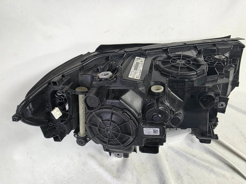 This image shows the left-side Adaptive LED headlight (ICON design) for the BMW 6 Series GT G32 model, featuring OEM genuine quality with part number 7496443. This used original headlamp is designed to deliver advanced Adaptive LED lighting with BMW’s ICON styling, offering precise fitment, enhanced road illumination, and premium performance for the 6 Series Gran Turismo.