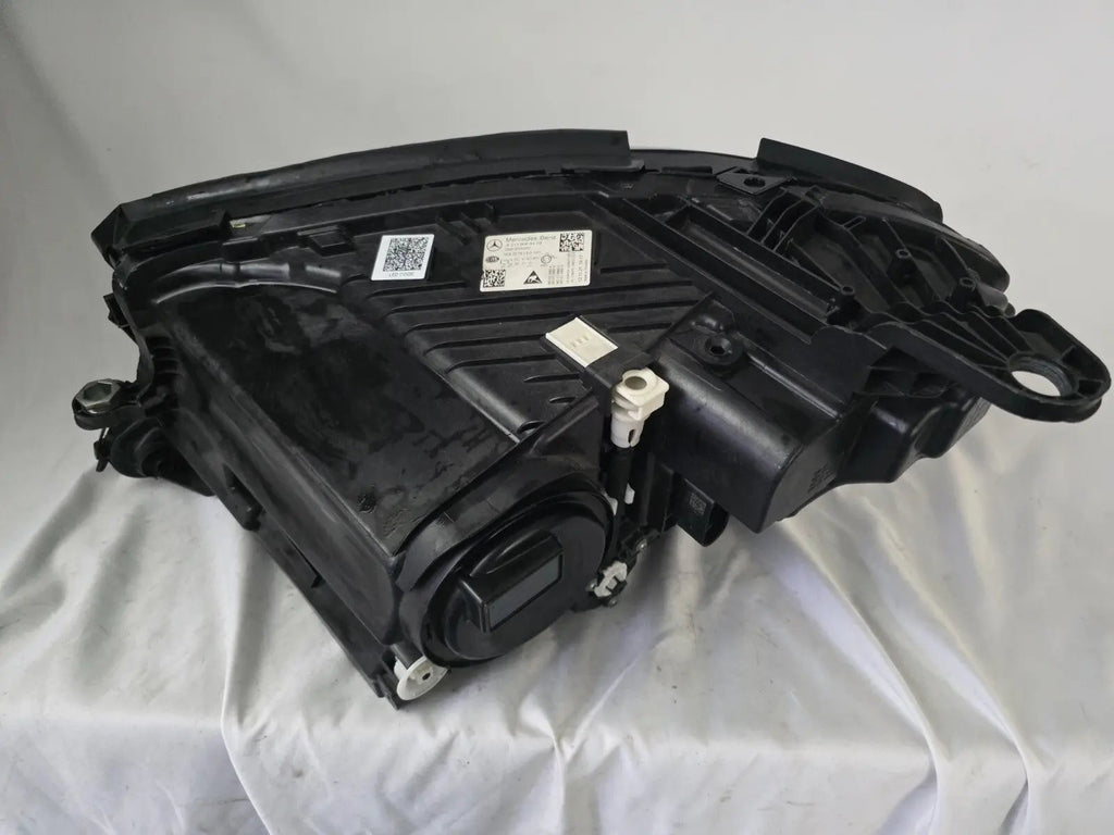 This image features the right-side MultiBeam LED headlight for the Mercedes-Benz E-Class W213 Facelift (FL) model, with OEM genuine quality and part number A2139068409. This used original headlamp is designed for the facelifted W213, offering precision-fit installation, advanced MultiBeam LED technology for adaptive lighting, and the premium performance expected from Mercedes-Benz components.