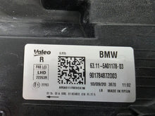 Load image into Gallery viewer, Used genuine BMW Adaptive LED headlight for X1 F48 LCI (facelift) model. This right-side OEM headlamp, part number 5A01178, is equipped with adaptive lighting technology for improved night visibility and cornering performance. The image displays the original right Adaptive LED headlight in used condition, showing the clear lens, mounting brackets, and electrical connectors — an ideal OEM replacement for BMW X1 F48 LCI vehicles.