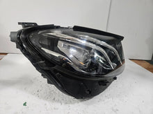 Load image into Gallery viewer, This image features the right-side LED High Performance headlight for the Mercedes-Benz E-Class W213, showcasing OEM genuine quality with part number A2139064004. Specifically designed for the W213 model, this used headlight offers high-performance LED illumination and is an original Mercedes-Benz component, ensuring precise fit and reliable functionality