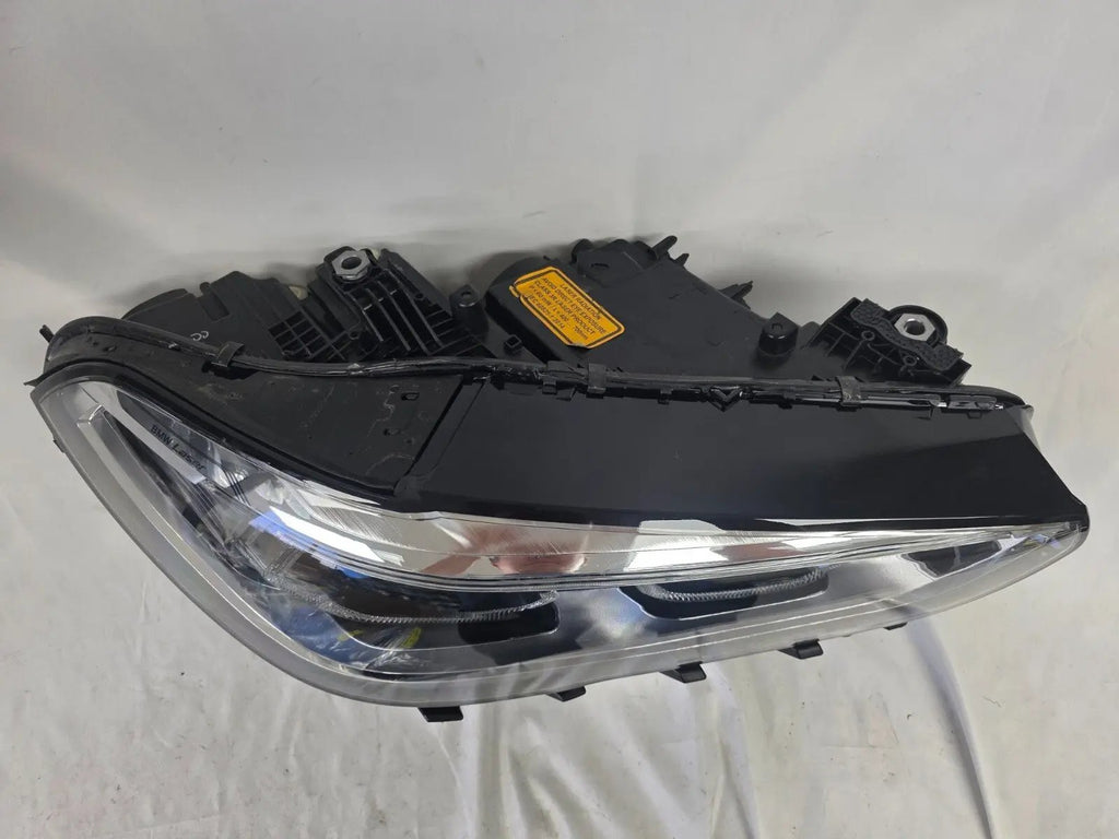 This image displays the right-side Laser headlight for BMW models X5 G05, X5 M F95, X6 G06, and X6 M F96, featuring OEM genuine quality with part number 9481790. This used original headlamp is designed for a precise factory fit and delivers advanced BMW Laserlight technology, ensuring superior illumination, modern styling, and high-performance visibility for these premium SUV models.