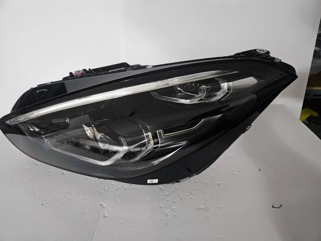 This image displays the left-side LED headlight for the BMW Z4 G29 model, featuring OEM genuine quality with part number 9481251. This used original headlamp is specifically designed for the G29 generation, offering precise fitment, sharp LED illumination, and the sleek, sporty design that complements the Z4's dynamic appearance.