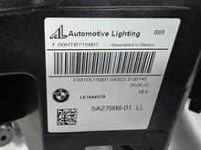 Load image into Gallery viewer, This image displays the right-side Laser headlight for BMW models X5 G05, X5 M F95, X6 G06, and X6 M F96, featuring OEM genuine quality with part number 5A27998. This used original headlamp delivers cutting-edge BMW Laserlight technology, offering enhanced night visibility, precise fitment, and a sleek, high-performance design tailored for these luxury SUV models.