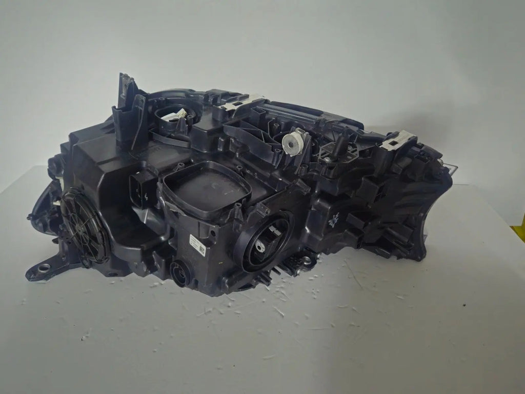 This image features the right-side Adaptive LED headlight (ICON design) for the BMW 7 Series G11 and G12 models, showcasing OEM genuine quality with part number 7408710. This used original headlamp offers BMW’s signature Adaptive LED with ICON styling, providing dynamic lighting performance, precise fitment, and premium functionality tailored for the luxury 7 Series lineup.