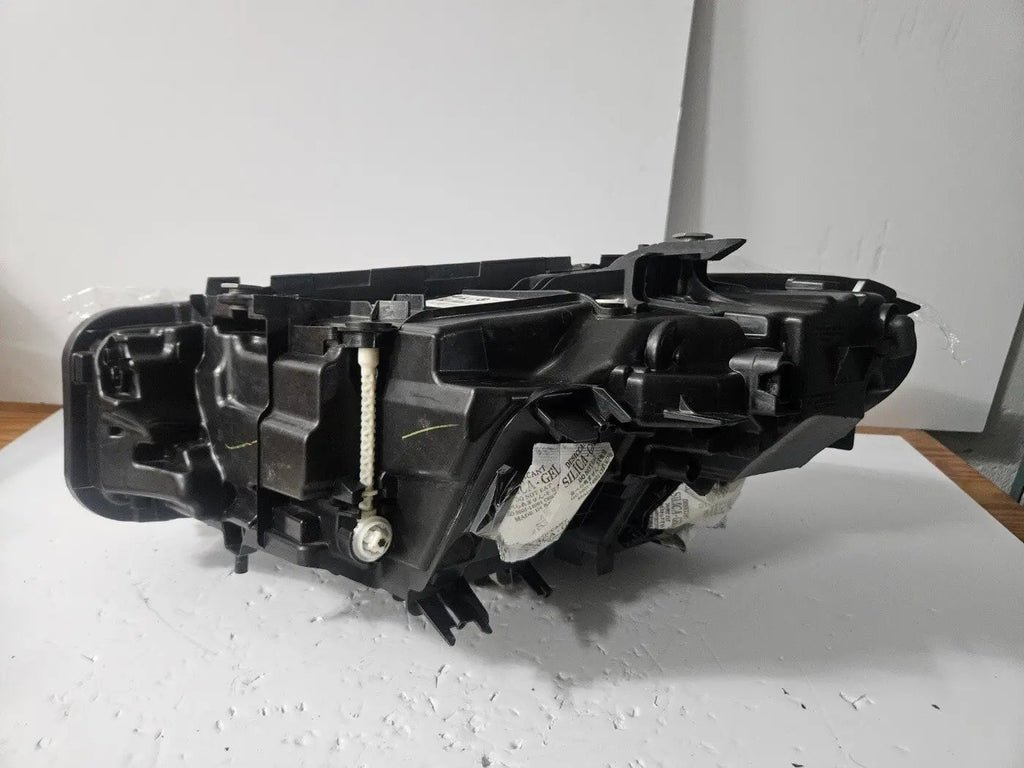 This image features the right-side Adaptive LED headlight for the BMW 3 Series G20 LCI and G21 LCI models, with OEM genuine quality and part number 5A1A354. This used original headlamp is designed for the facelifted versions, offering precise fitment, dynamic beam control, and advanced Adaptive LED technology to enhance visibility and maintain the sleek, modern appearance of the 3 Series.