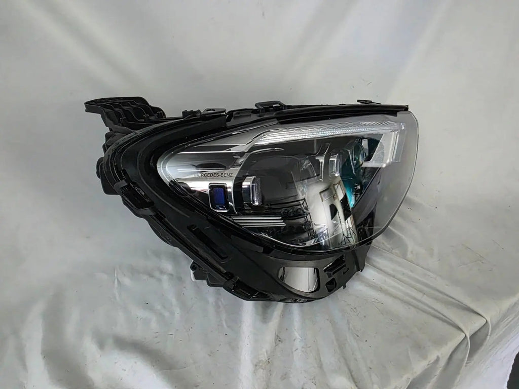 This image features the right-side MultiBeam LED headlight for the Mercedes-Benz E-Class W213 Facelift (FL) model, with OEM genuine quality and part number A2139068409. This used original headlamp is designed for the facelifted W213, offering precision-fit installation, advanced MultiBeam LED technology for adaptive lighting, and the premium performance expected from Mercedes-Benz components.