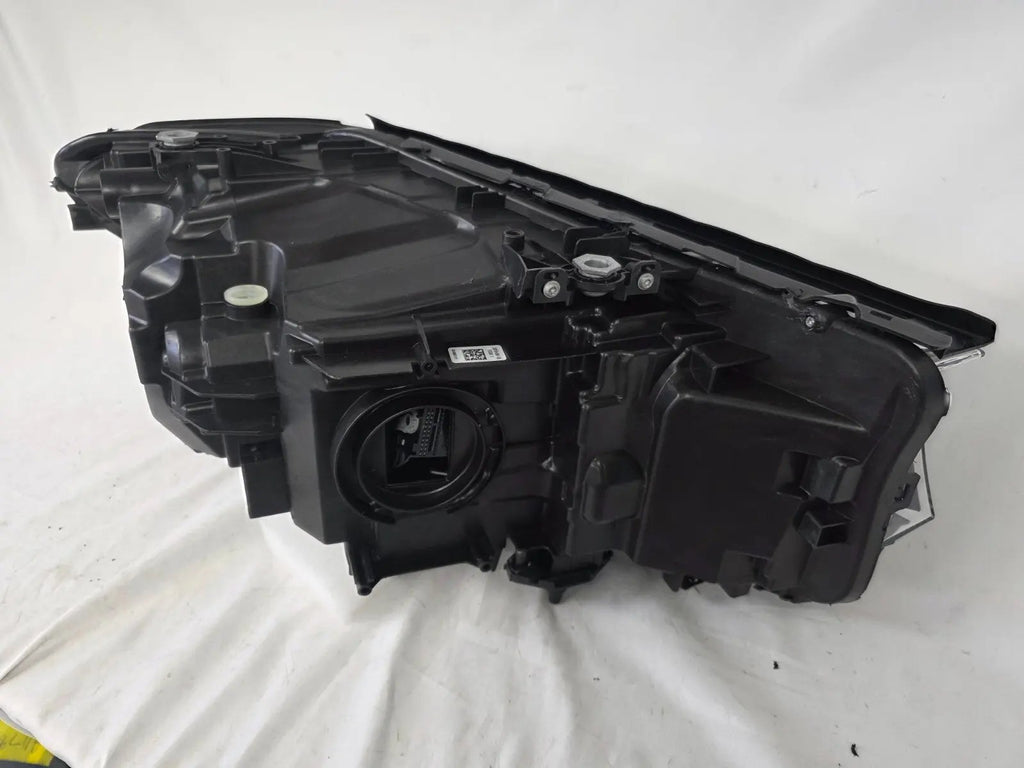 This image shows the left-side LED headlight for the BMW 5 Series G30 and G31 models, featuring OEM genuine quality with part number 7439199. This used original headlamp is engineered for a precise fit on the left side, offering bright and efficient LED illumination, modern styling, and the reliable performance expected from BMW components.