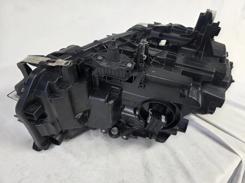 This image shows the left-side Adaptive LED headlight (ICON design) for the BMW 6 Series GT G32 model, featuring OEM genuine quality with part number 7496443. This used original headlamp is designed to deliver advanced Adaptive LED lighting with BMW’s ICON styling, offering precise fitment, enhanced road illumination, and premium performance for the 6 Series Gran Turismo.