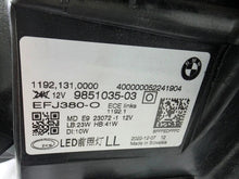 Load image into Gallery viewer, Used genuine BMW LED headlight for 4 Series models including G22, G23, G26, G80, G82, and G83. This left-side OEM headlamp, part number 9851035, is designed to perfectly fit and function in compatible BMW vehicles. The image shows the original BMW LED headlight in used condition with visible connectors, housing, and lens – ideal for replacement or repair of your vehicle’s front lighting system.