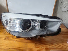 Load image into Gallery viewer, This image shows the right-side Bi-Xenon headlight for the BMW 5 Series GT F07 model, featuring OEM genuine quality with part number 7262720. It is a used original headlight designed for precise fit on the right side of the BMW F07 Gran Turismo, offering advanced Bi-Xenon lighting performance and durable OEM construction