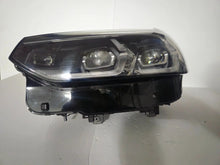 Load image into Gallery viewer, This image features the left-side Adaptive LED headlight for BMW models including iX3 G08, X3 G01, X3 M F97, X4 G02, and X4 M F98, with OEM genuine quality and part number 5A29203. This used original headlamp provides precise fitment and BMW’s advanced Adaptive LED technology, ensuring enhanced visibility, dynamic beam control, and premium styling for these performance SUVs.