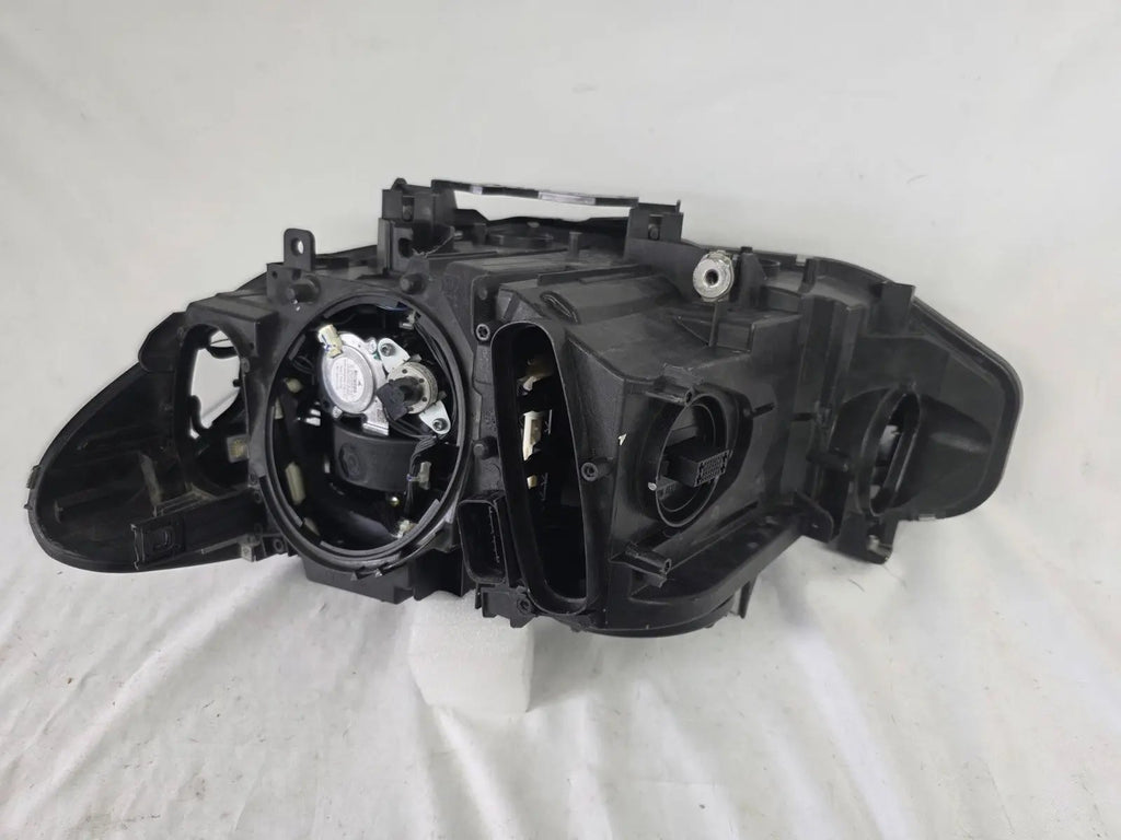 Genuine used BMW Adaptive LED headlight for 4 Series models F32, F33, F36, F80 LCI, F82, and F83. This right-side OEM headlamp, part number 7377842, is designed with adaptive lighting technology for improved visibility and performance. The image highlights the complete original headlight unit in used condition, including the clear lens, mounting points, and electrical connectors — ideal for replacement on compatible BMW models.